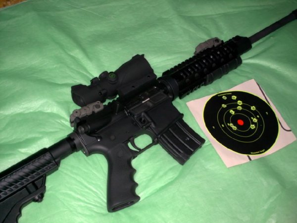 DPMS 5.56 AR15.. with 3MOA Red 'T' Dot