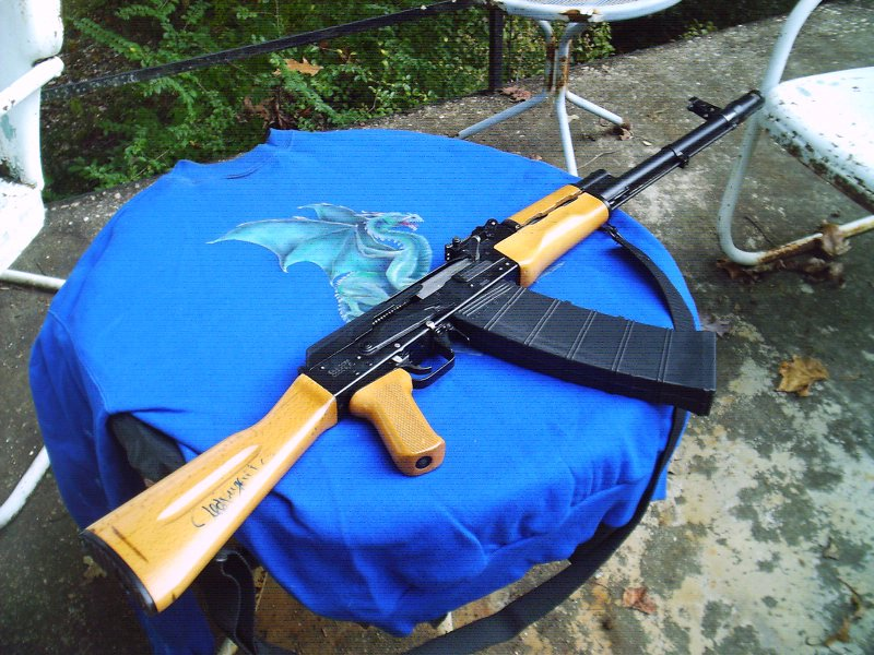 has anybody put wood furniture on thier saiga 12? Saiga12 forum